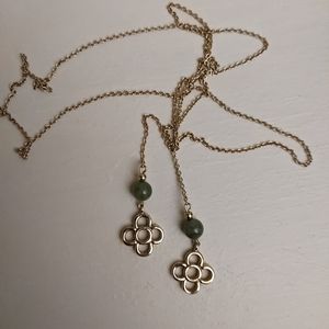 Vintage 32" gold tone necklace with two green glass beads